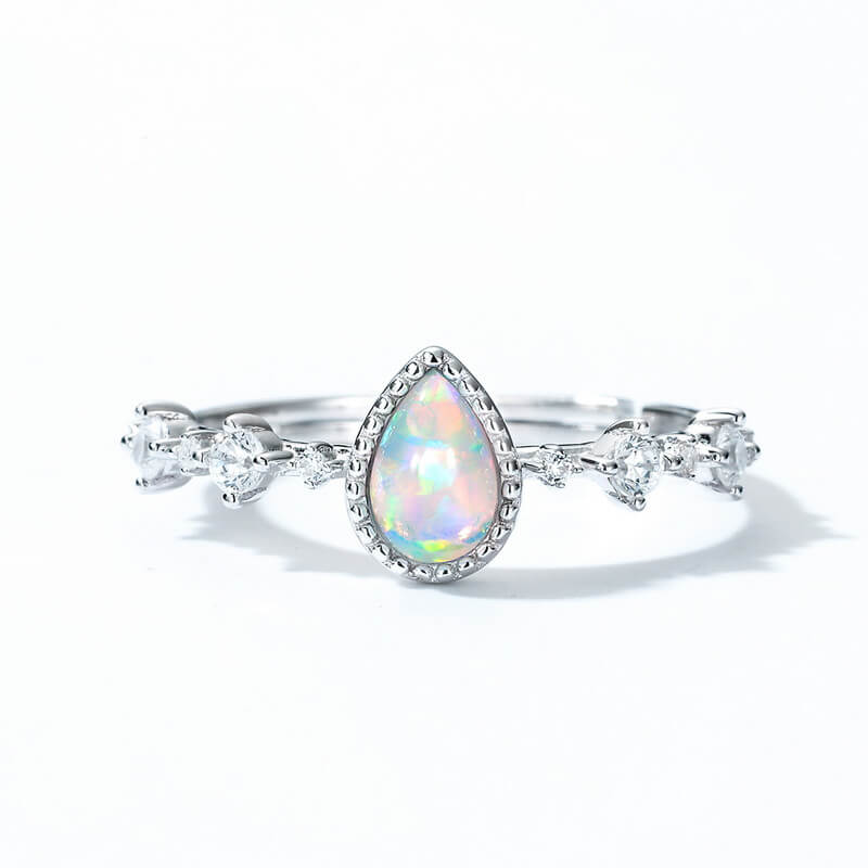 Classic silver opal jewelry ring reflecting emotional depth, clarity and peaceful glow.