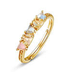 Gold quartz and peridot jewelry ring designed to inspire optimism, creativity and peace.