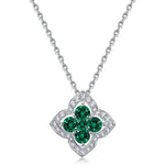 Four-leaf clover emerald pendant necklace symbolising hope, confidence and clarity.