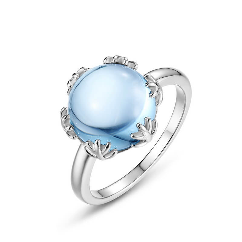 Sky blue topaz jewelry ring in sterling silver symbolising emotional balance and healing.