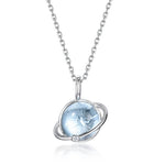 Universe-inspired blue topaz jewelry necklace reflecting cosmic love and calm serenity.