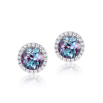 Round-cut alexandrite engagement earrings crafted to express enduring love and renewal.