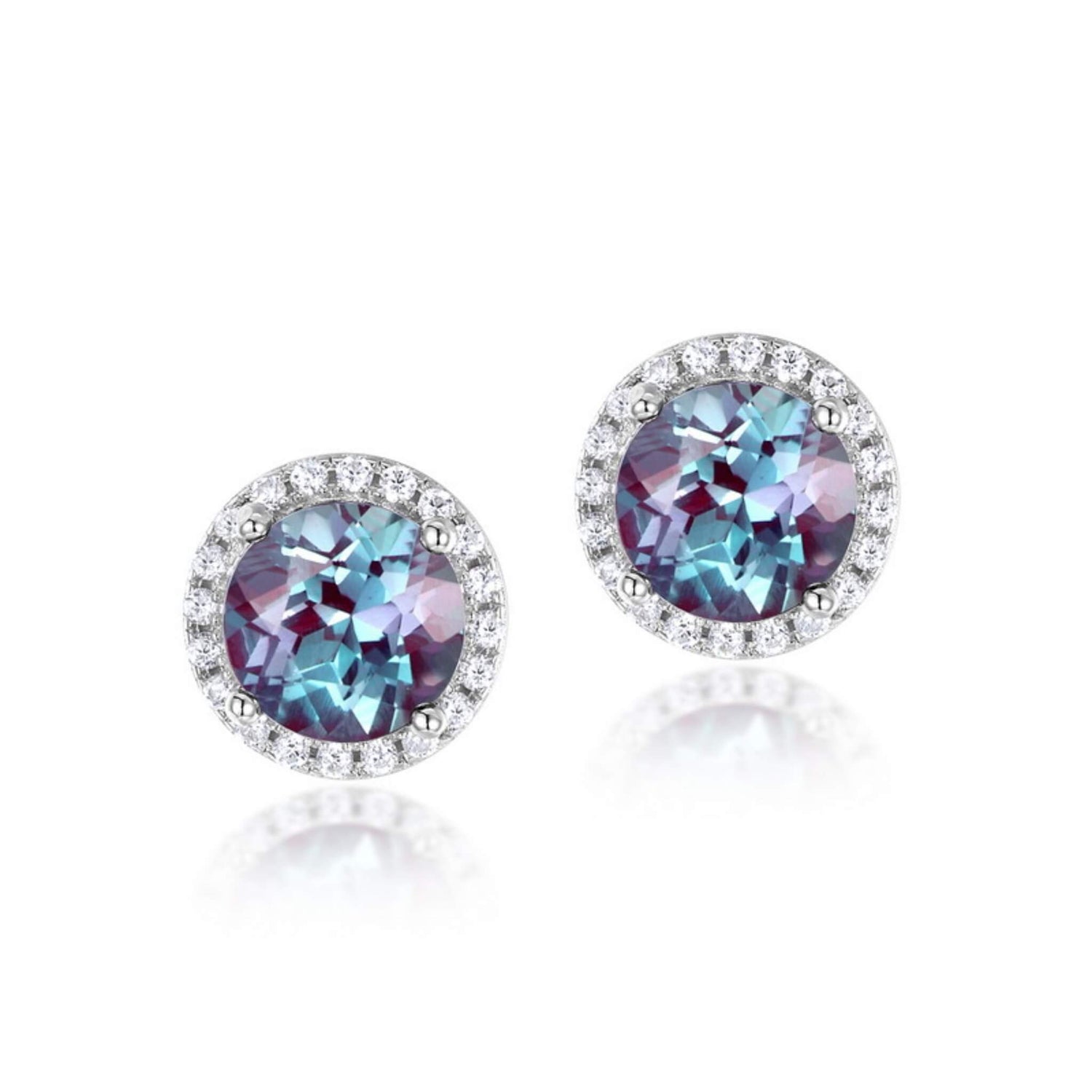 Round-cut alexandrite engagement earrings crafted to express enduring love and renewal.
