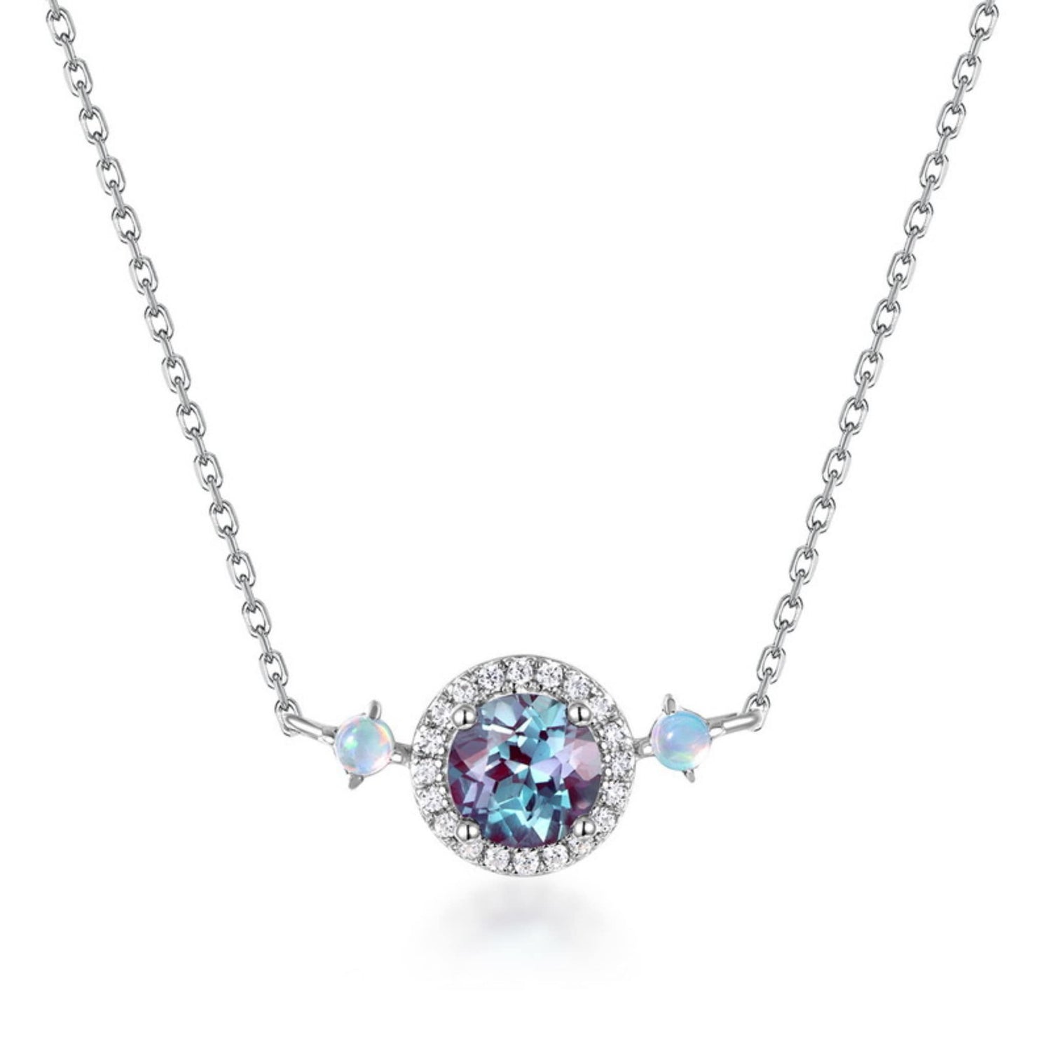 Round alexandrite necklace reflecting balance and light in sterling silver, designed by Minerva Jewelry.