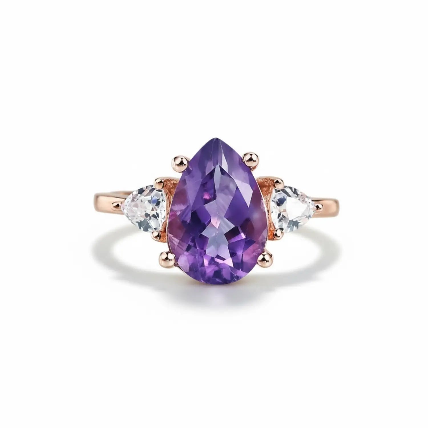 Amethyst ring in rose gold tones, radiating calm and serenity with gentle brilliance.