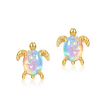 Sea turtle-shaped opal jewelry earrings in gold, designed to symbolise joy and emotional well-being.