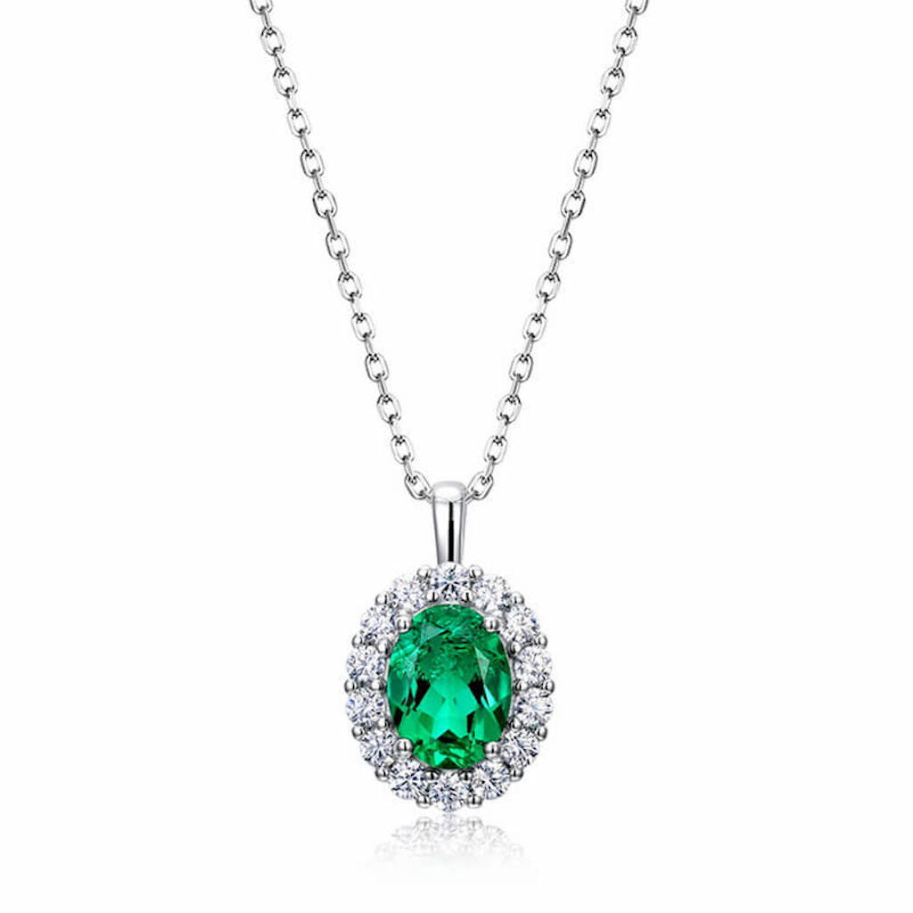 Emerald and diamond necklace representing luxury, wisdom and prosperity by Minerva Jewelry.