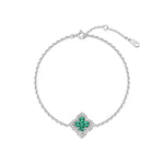 Emerald charm bracelet in sterling silver, crafted to inspire balance and beauty.
