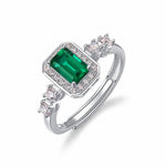 Emerald-cut green ring crafted in sterling silver, representing wisdom and balance.