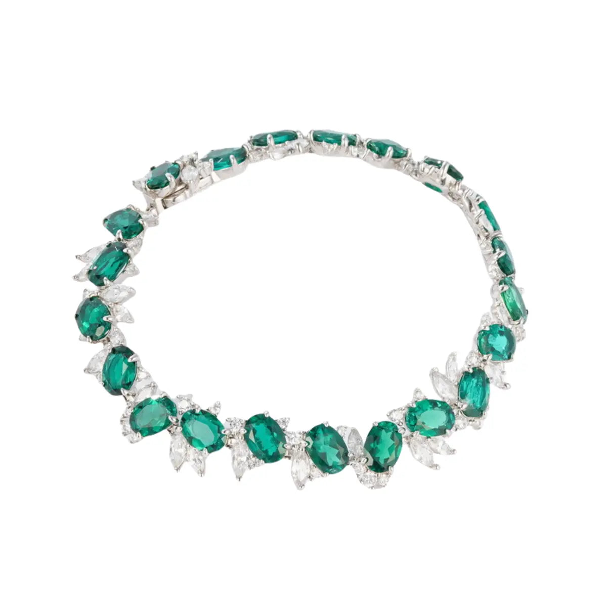 Emerald and diamond statement necklace representing confidence and refined luxury.