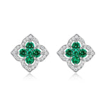 Clover emerald earrings symbolising fortune and renewal, designed by Minerva Jewelry.
