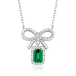 Emerald pendant necklace representing modern sophistication and spiritual growth.
