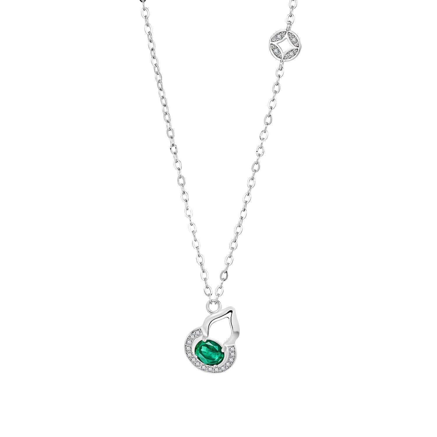 Emerald gourd pendant necklace symbolising health, luck and new beginnings.