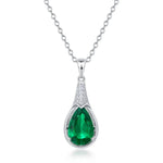 Teardrop-cut emerald necklace radiating balance, harmony and emotional renewal.