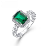 Eternity emerald ring in sterling silver, celebrating loyalty and enduring energy.