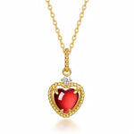 Heart-shaped garnet pendant in silver, crafted to express pure affection and calm strength.