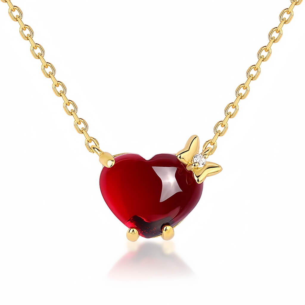 Garnet necklace with butterfly accent representing tenderness and rebirth by Minerva Jewelry.