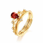 Heart-shaped garnet ring symbolising deep love and devotion by Minerva Jewelry.