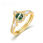 Gold moss agate jewelry ring set radiating positive energy and emotional grounding.