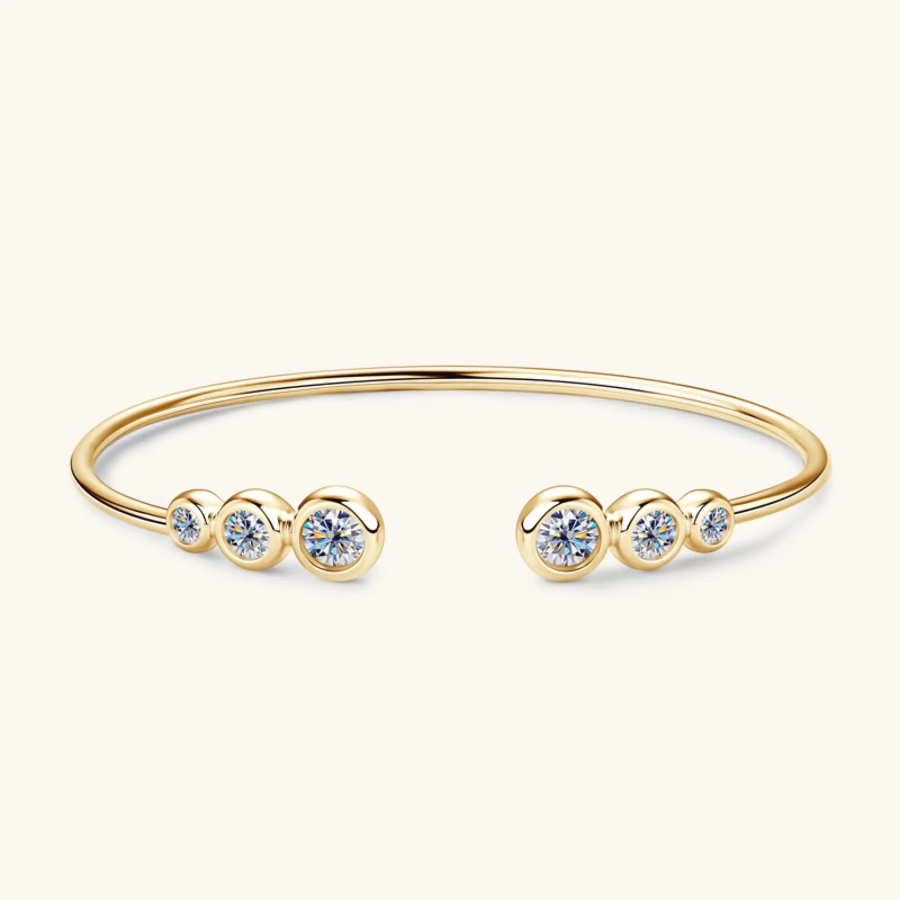 Gold moissanite jewelry cuff bracelet symbolising balance, openness and refined elegance.