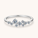 Silver moissanite jewelry ring representing quiet promise, strength and lasting affection.