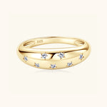 Gold moissanite jewelry ring symbolising inner strength, calm brilliance and courage.