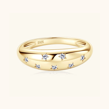 Gold moissanite jewelry ring symbolising inner strength, calm brilliance and courage.
