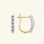 Gold moissanite jewelry drop earrings crafted for purity, grace and modern brilliance.