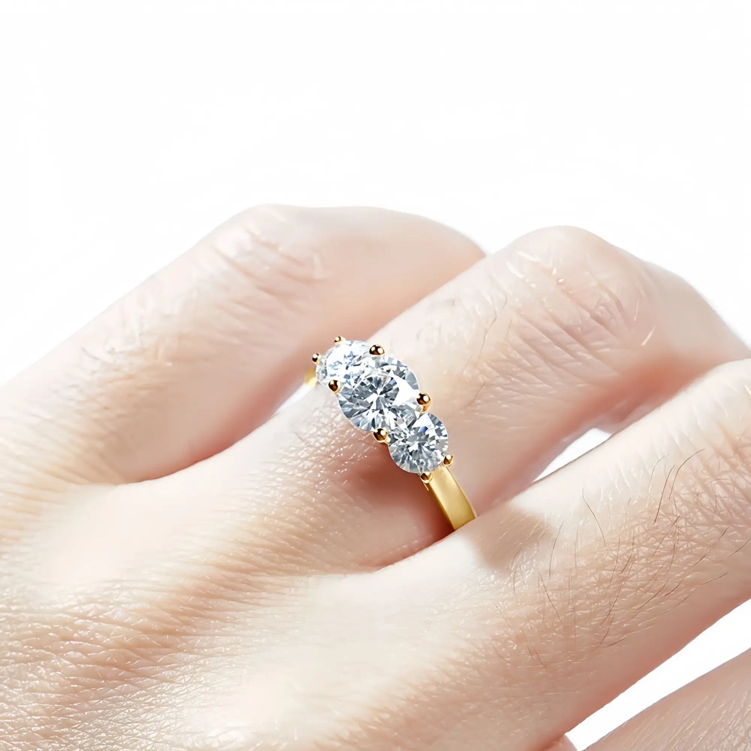 Three Stone Moissanite Engagement Ring in Gold
