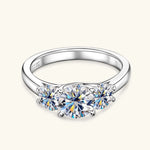 Silver moissanite engagement ring expressing commitment, harmony and devotion.