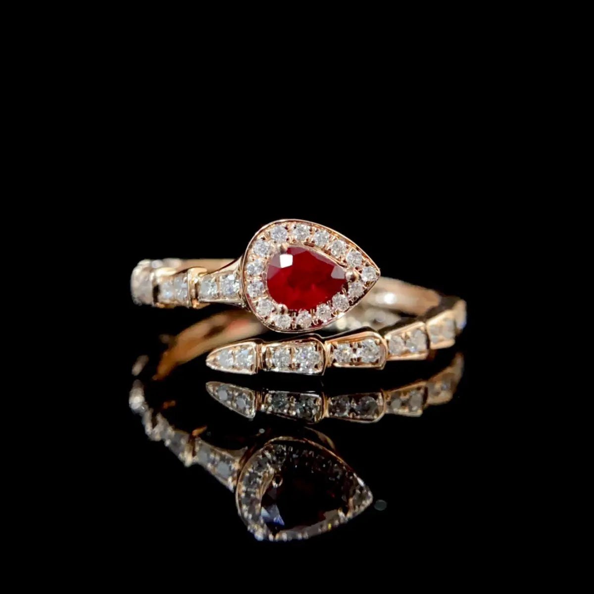Ruby diamond jewelry ring in gold symbolising passion, unity and boundless love.
