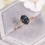Alexandrite engagement ring glowing with inner confidence and balance by Minerva Jewelry.