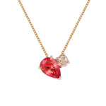 Ruby Diamond Necklace in 14K gold featuring a vivid pear-cut ruby and a bright diamond.