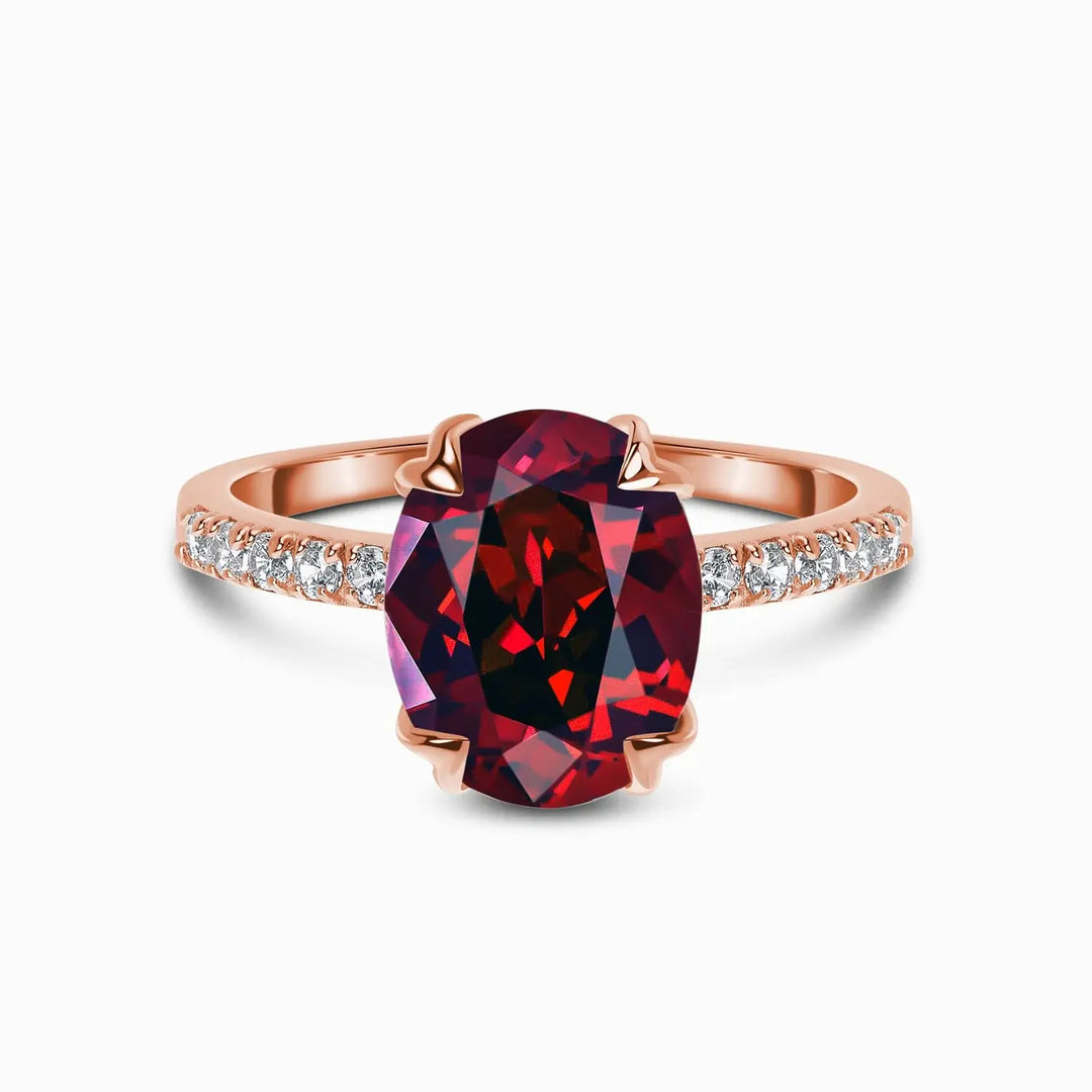 Ruby Gold Ring in 14K rose gold showcasing a vivid red gemstone with a brilliant diamond band.