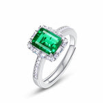 Sterling silver emerald ring reflecting refined craftsmanship and calm brilliance.