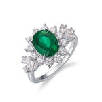 Oval emerald engagement ring symbolising growth, trust and lasting love.