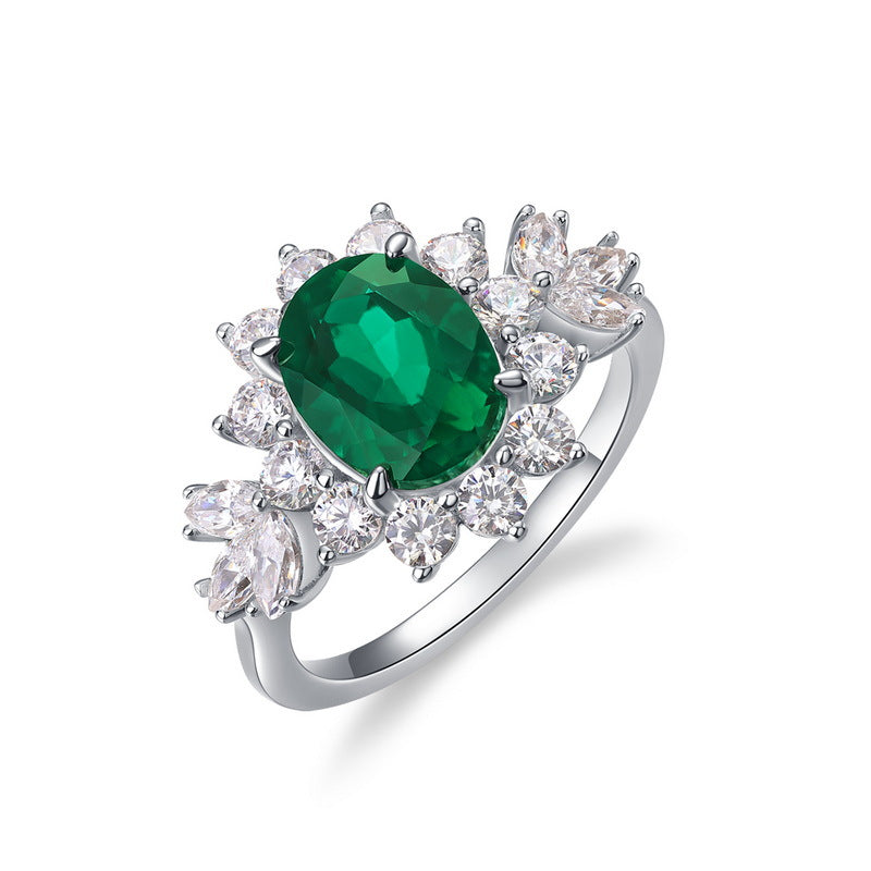 Oval emerald engagement ring symbolising growth, trust and lasting love.