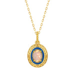 Vintage gold opal jewelry necklace symbolising beauty, compassion and authenticity.