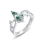 Vintage moss agate jewelry ring with leafy details symbolising growth and balance.