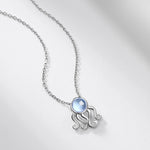 Ocean Wave Sky Blue Topaz Pendant - Minerva Jewelry