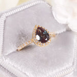 Pear-cut alexandrite engagement ring radiating harmony and devotion by Minerva Jewelry.