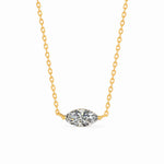 Marquise-cut moissanite necklace with the stone set horizontally between two chain ends.