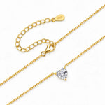 Heart-cut moissanite solitaire necklace with a fine chain attached at both sides.