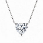 Heart-cut moissanite solitaire necklace with a fine chain attached at both sides.