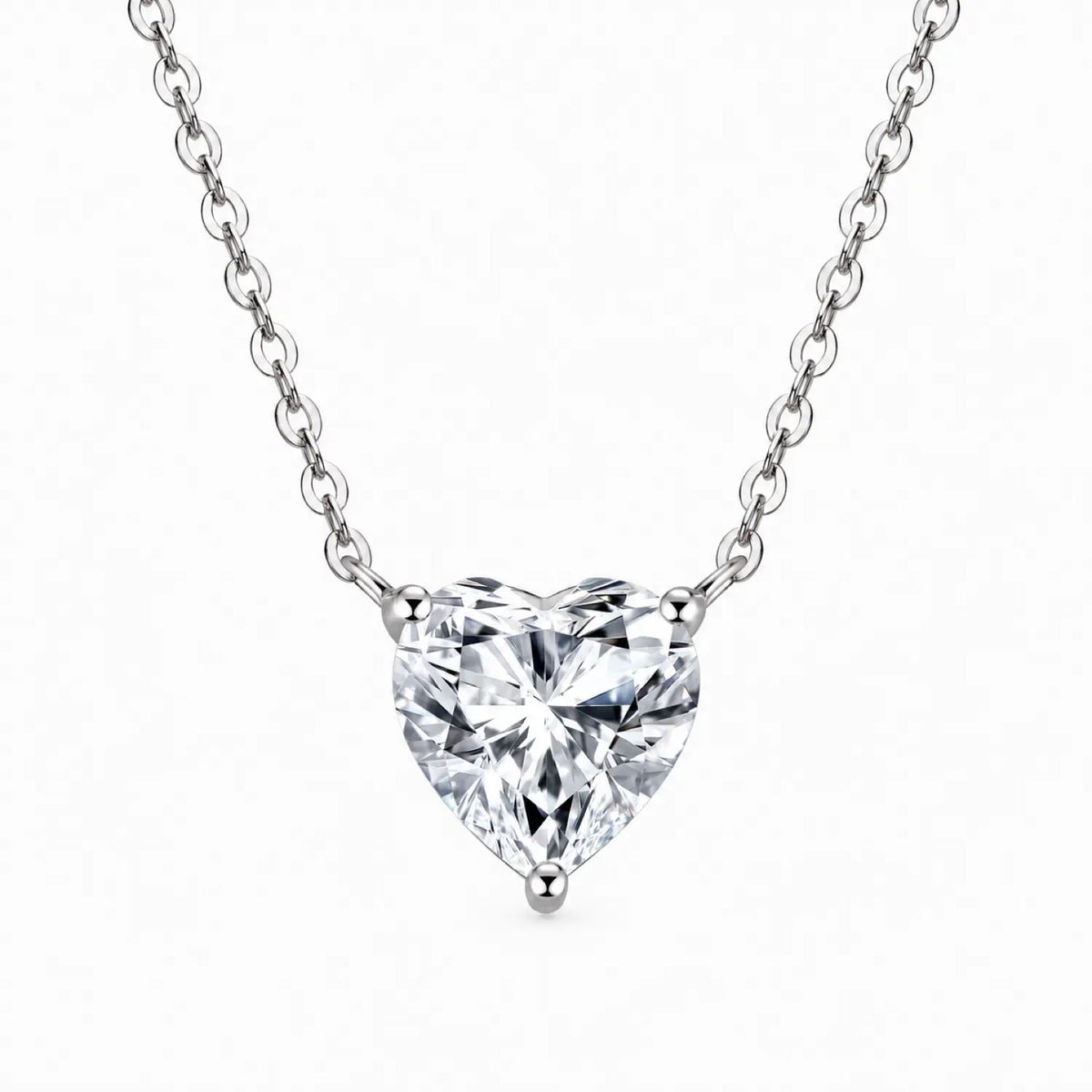 Heart-cut moissanite solitaire necklace with a fine chain attached at both sides.