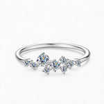 Silver moissanite jewelry ring representing quiet promise, strength and lasting affection.