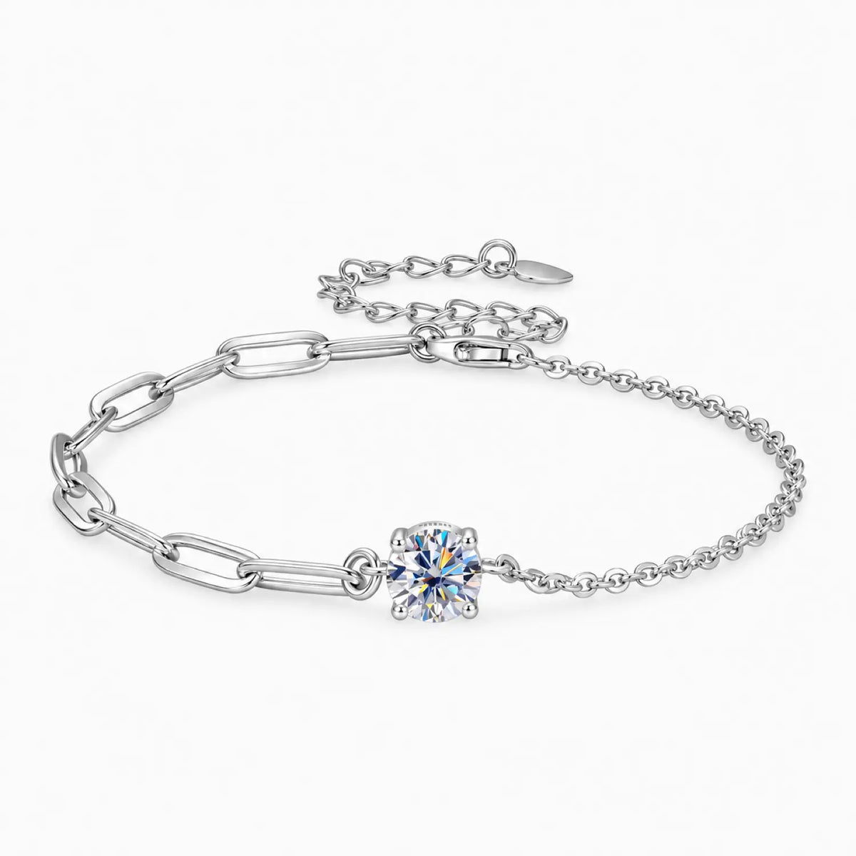 Silver tone asymmetric solitaire moissanite bracelet with paperclip links and a fine chain