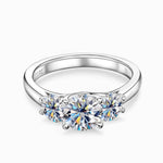 Silver-tone round three stone moissanite ring, prong setting
