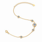 Yellow gold tone five-stone bezel-set moissanite bracelet