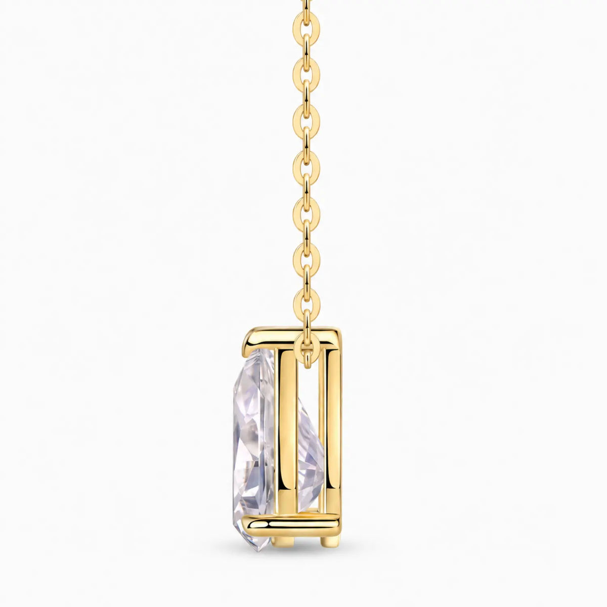 Pear-cut moissanite solitaire pendant on a fine chain.